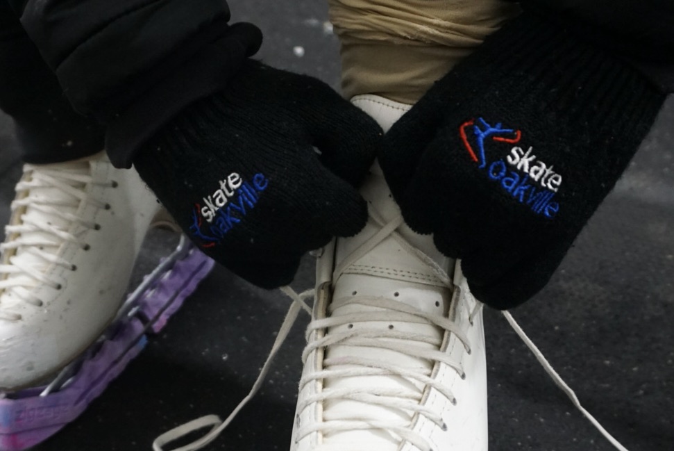 Hands wearing Skate Oakville gloves Hands wearing Skate Oakville gloves